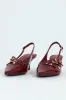 Multi Buckle Pointed Toe Slingback Heel - Red sold by Edgars 
