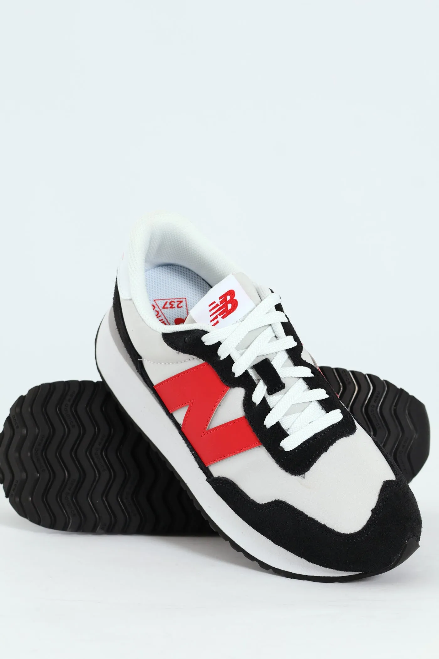 Foam Wedge Lace Up Sneaker - White/Black sold by Edgars