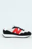 Foam Wedge Lace Up Sneaker - White/Black sold by Edgars 