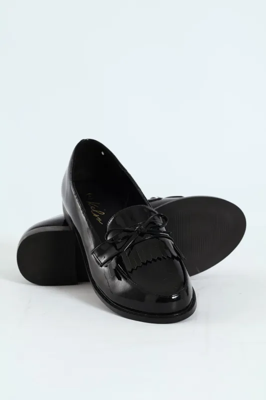 Apron Tassled Patent Loafer - Black sold by Edgars