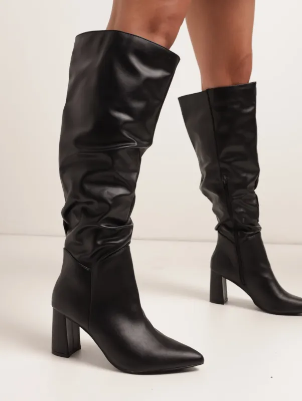 Ladies Knee-High Pointed Block Heel Wide Shuffle Boot - Black sold by Edgars