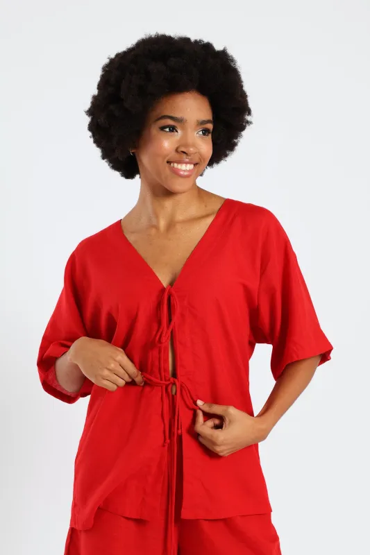 Oversized Tie Front Shirt - Red sold by Edgars