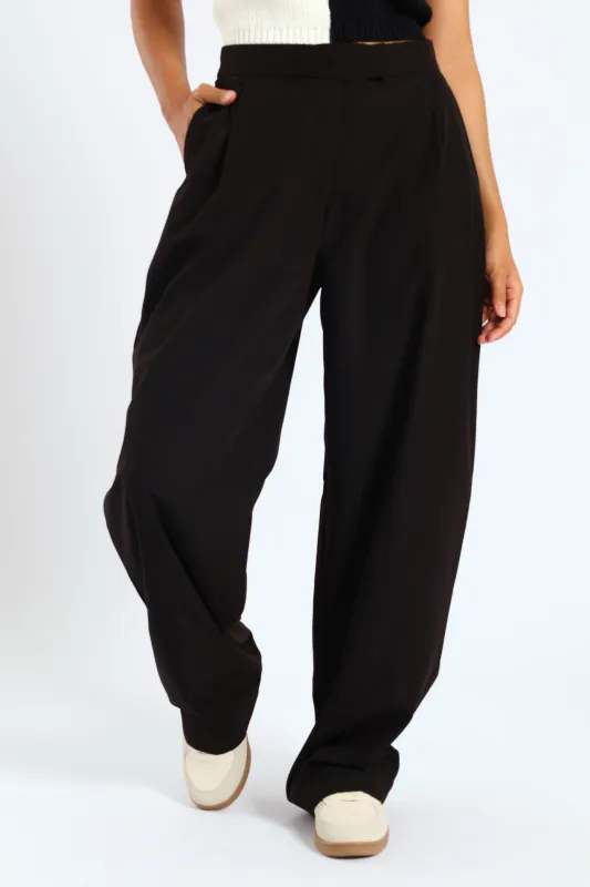 Smart Baggy Pleated Trouser - Black sold by Edgars