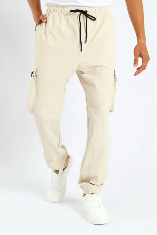 Zip Pocket Cargo Trousers - Light Stone sold by Edgars