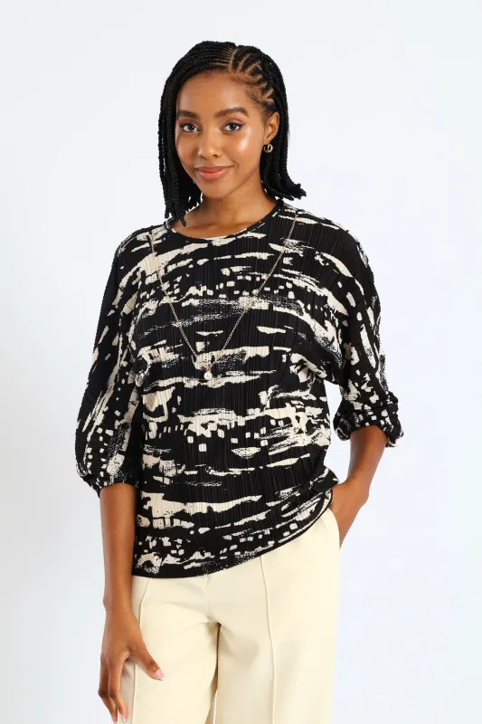 Monochrome Plisse Blouse - Black sold by Edgars