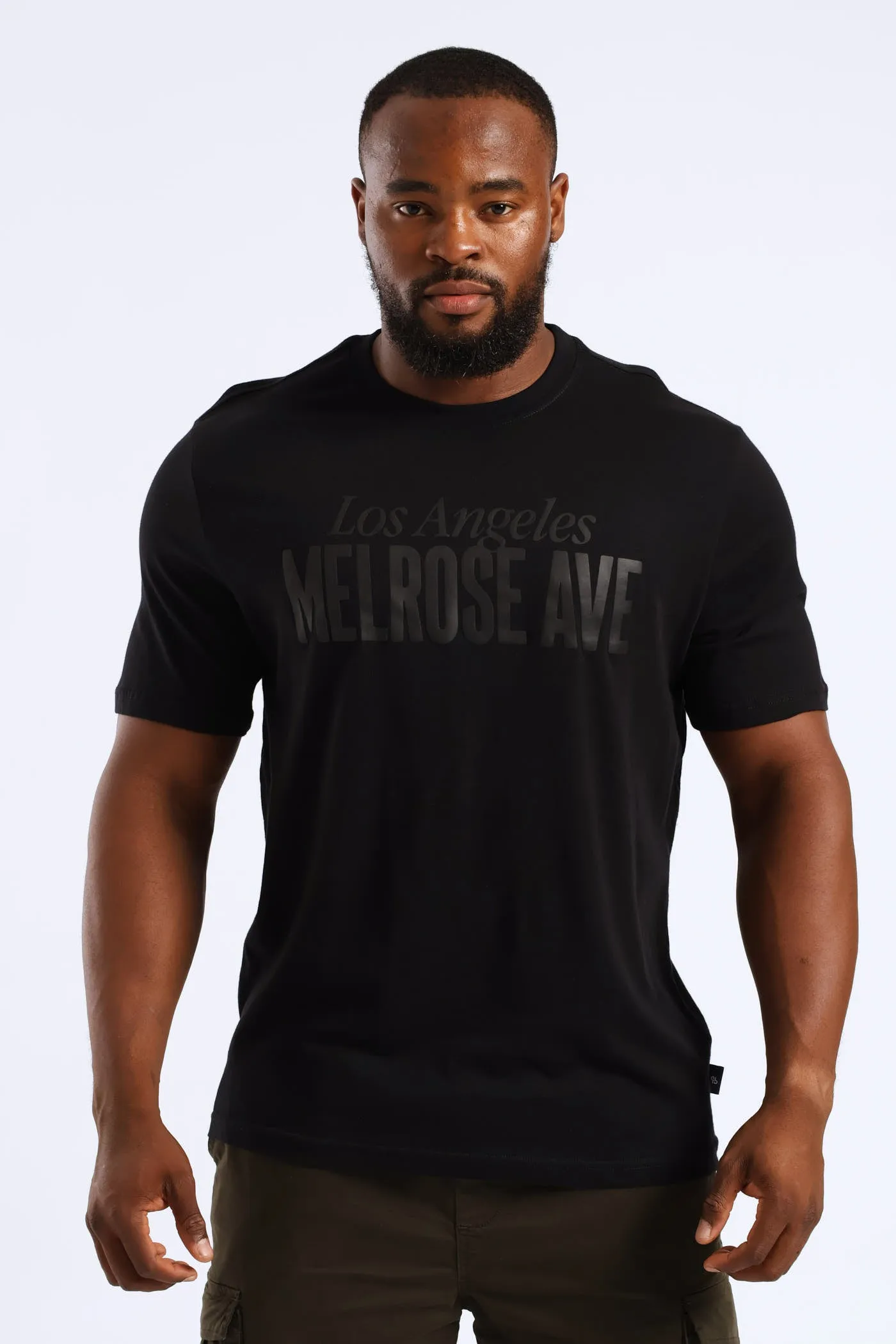 Melrose Ave HD Print Tee - Black sold by Edgars