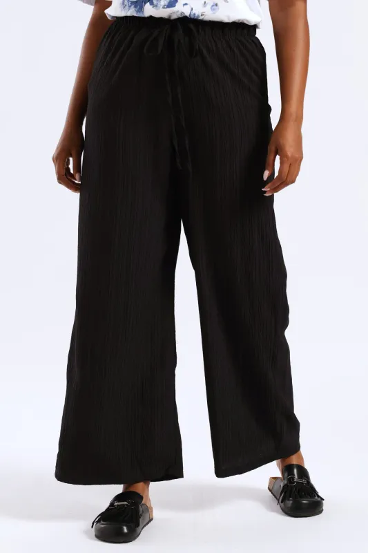Pull On Drawstring Crinkle Wideleg Pant - Black sold by Edgars