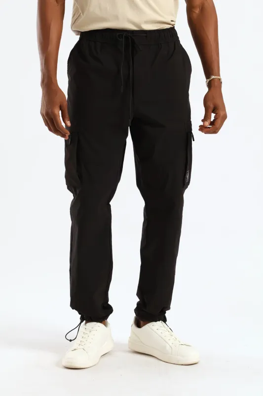 Zip Pocket Tech Utility Cargo Pants - Black sold by Edgars