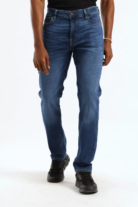 Mark Slim Tapered Jean - Mid Wash sold by Edgars