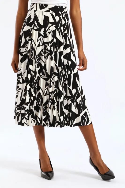 Button Pleated Midi Skirt - Black/Cream sold by Edgars