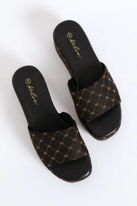 Monogram Slip On Flatform Mule Sandal - Black sold by Edgars