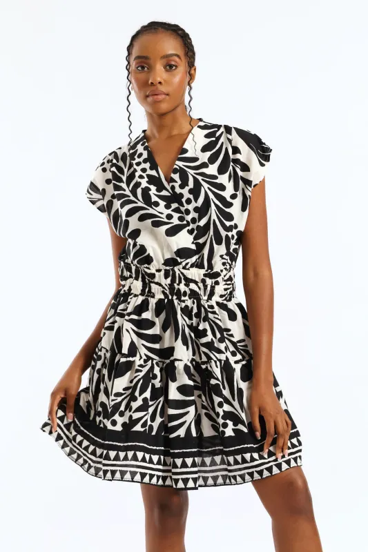 V-Neck Cross Over Elasticated Waist Mini Dress - Cream/Black sold by Edgars