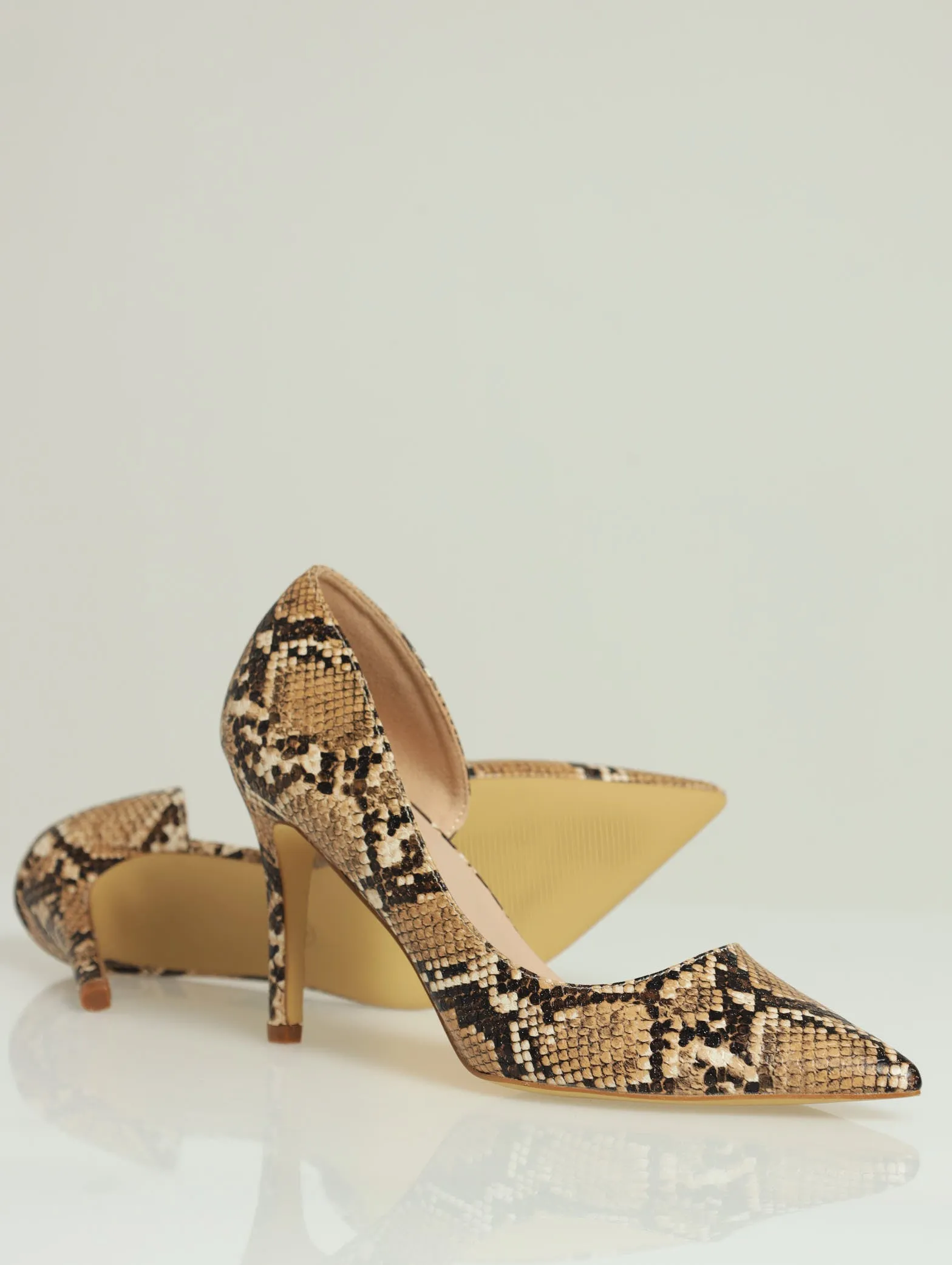 Snake Print Court Heel sold by Edgars
