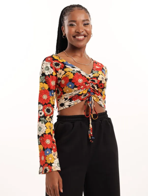 Ladies Long Sleeve Rouch Front Tee - Floral sold by Edgars