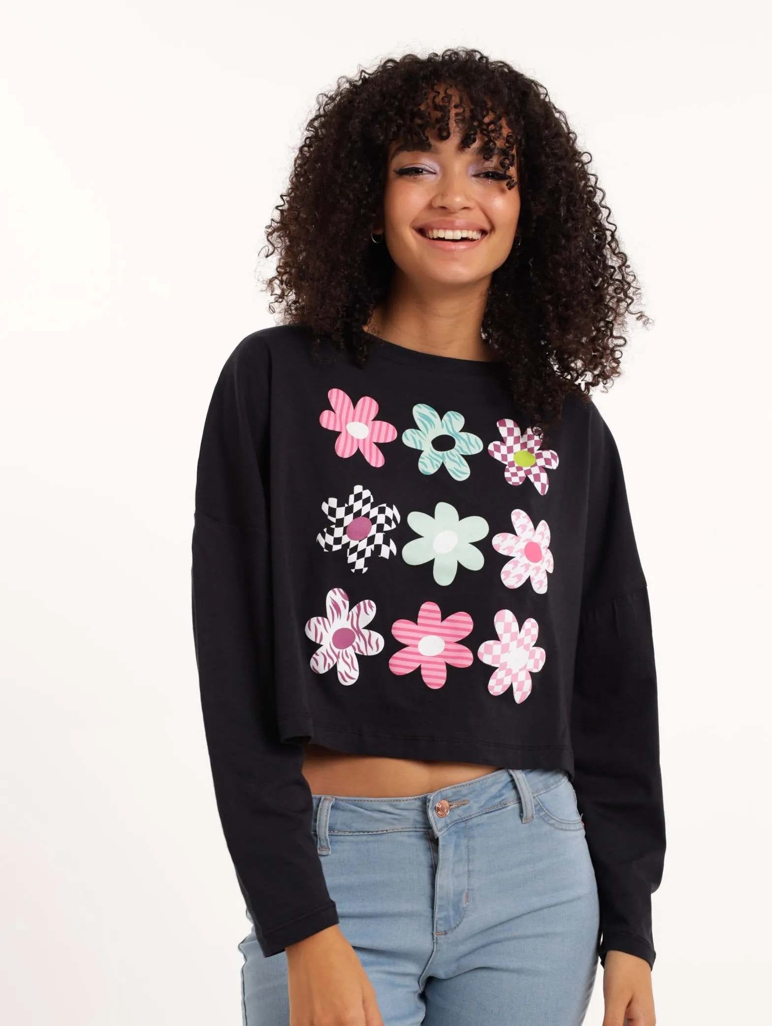 Ladies Long Sleeve Funky Flower Tee - Black sold by Edgars