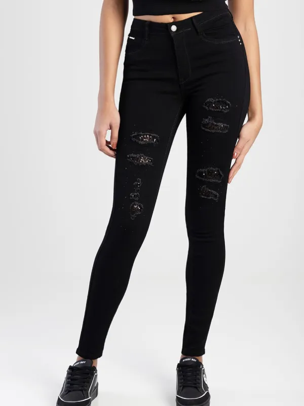 Jon Jon Skinny Denim Jean With Rip & Repair - Black sold by Edgars