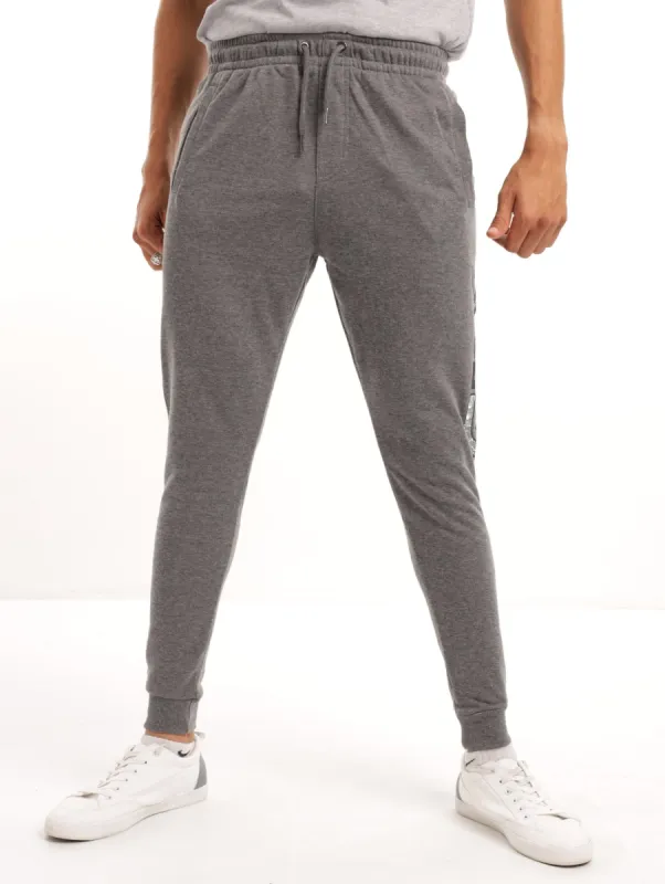 Men's Track Pants - Grey Melange sold by Edgars