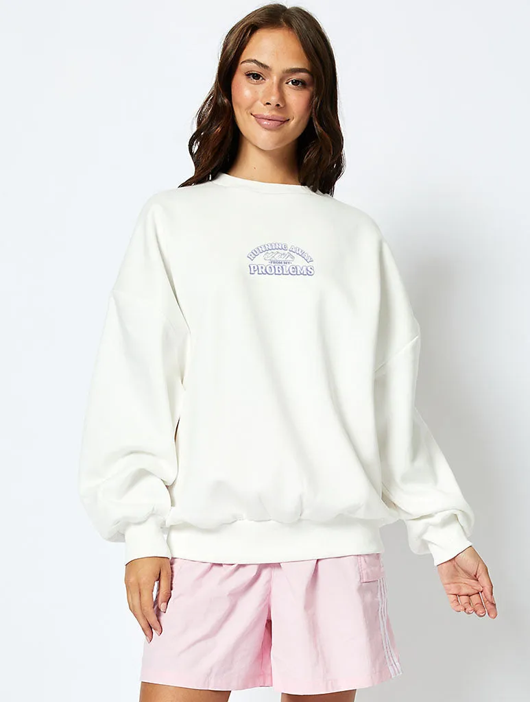 Running Away From My Problems Sweatshirt In Ecru sold by Skinnydip London