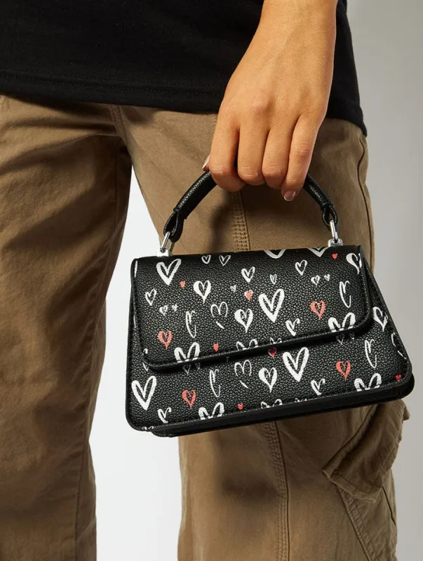 April Graffiti Hearts Cross Body Bag sold by Skinnydip London
