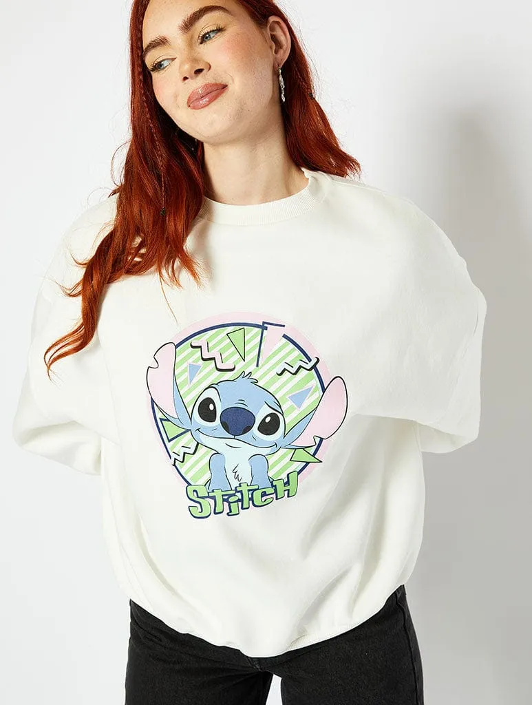 Disney Vintage Style Stitch Graphic Oversized Sweatshirt In Cream sold by Skinnydip London