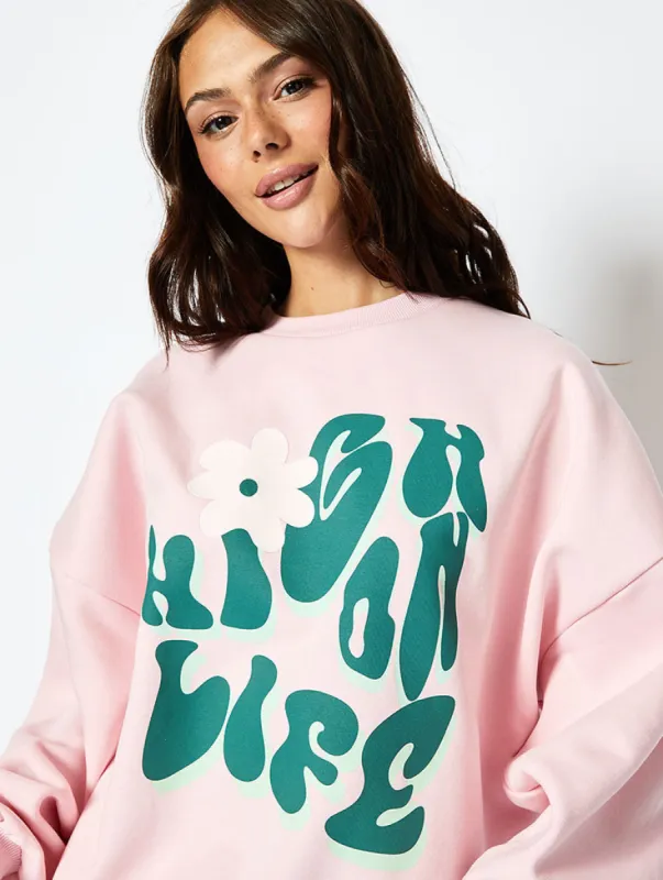 High On Life Sweatshirt in Pink sold by Skinnydip London