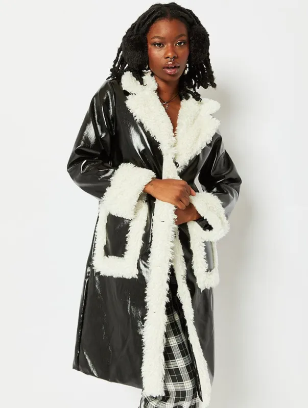 Patent Faux Leather Coat With Ivory Fur Trim sold by Skinnydip London