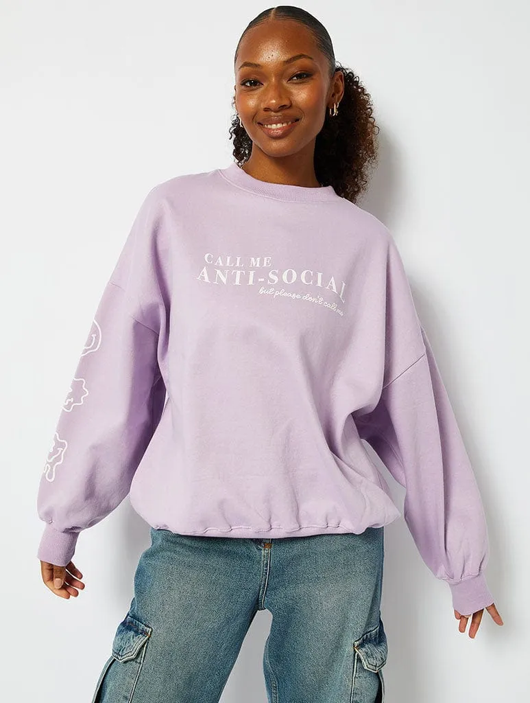 Call Me Antisocial Lilac Oversized Sweatshirt sold by Skinnydip London