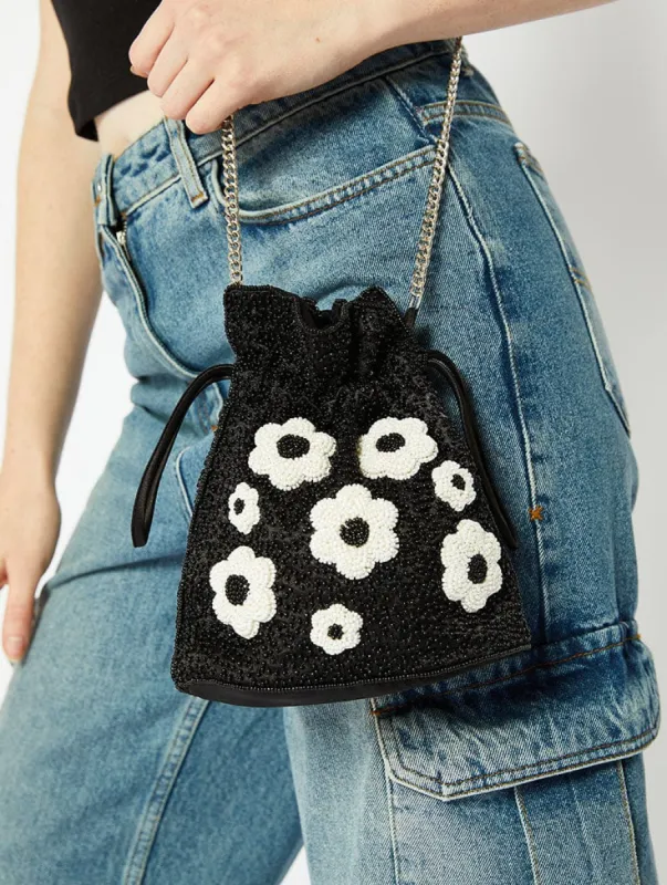 Black Beaded Flower Drawstring Bag sold by Skinnydip London