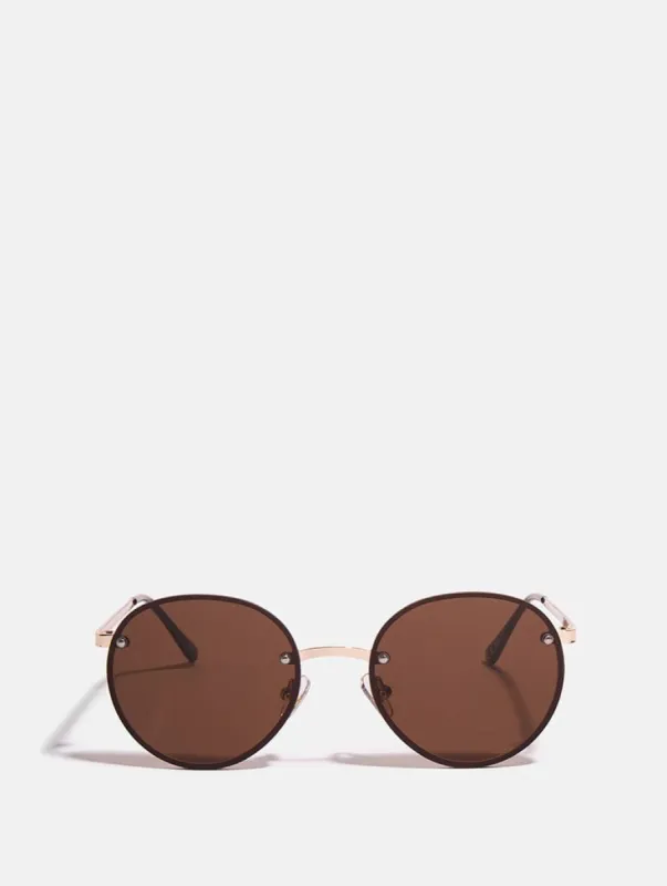 Smokey Frameless Round Sunglasses sold by Skinnydip London