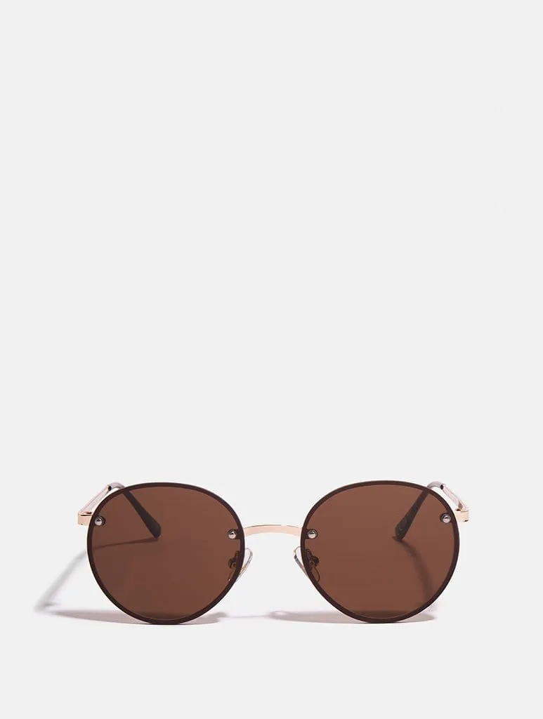 Smokey Frameless Round Sunglasses sold by Skinnydip London