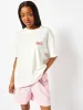 Disney Alice In Wonderland Oversized Ecru T-Shirt sold by Skinnydip London