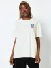 NFL x Skinnydip All Pro Bowl T-Shirt in Ecru sold by Skinnydip London