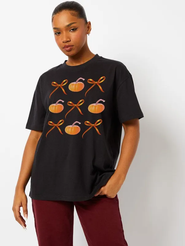 Pumpkin Bow T-Shirt in Black sold by Skinnydip London