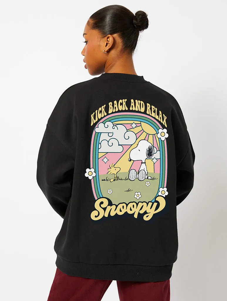 Peanuts x Skinnydip Snoopy Kick Back & Relax Sweatshirt in Black sold by Skinnydip London