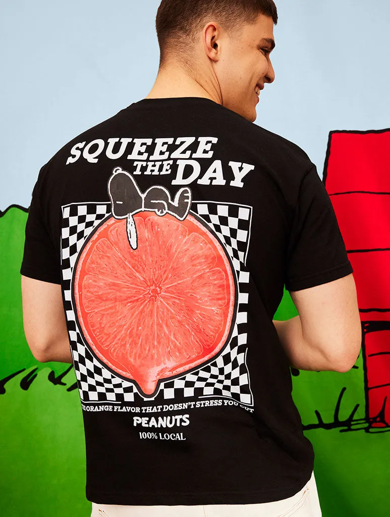 Peanuts x Skinnydip Snoopy Squeeze the Day T-Shirt in Black sold by Skinnydip London