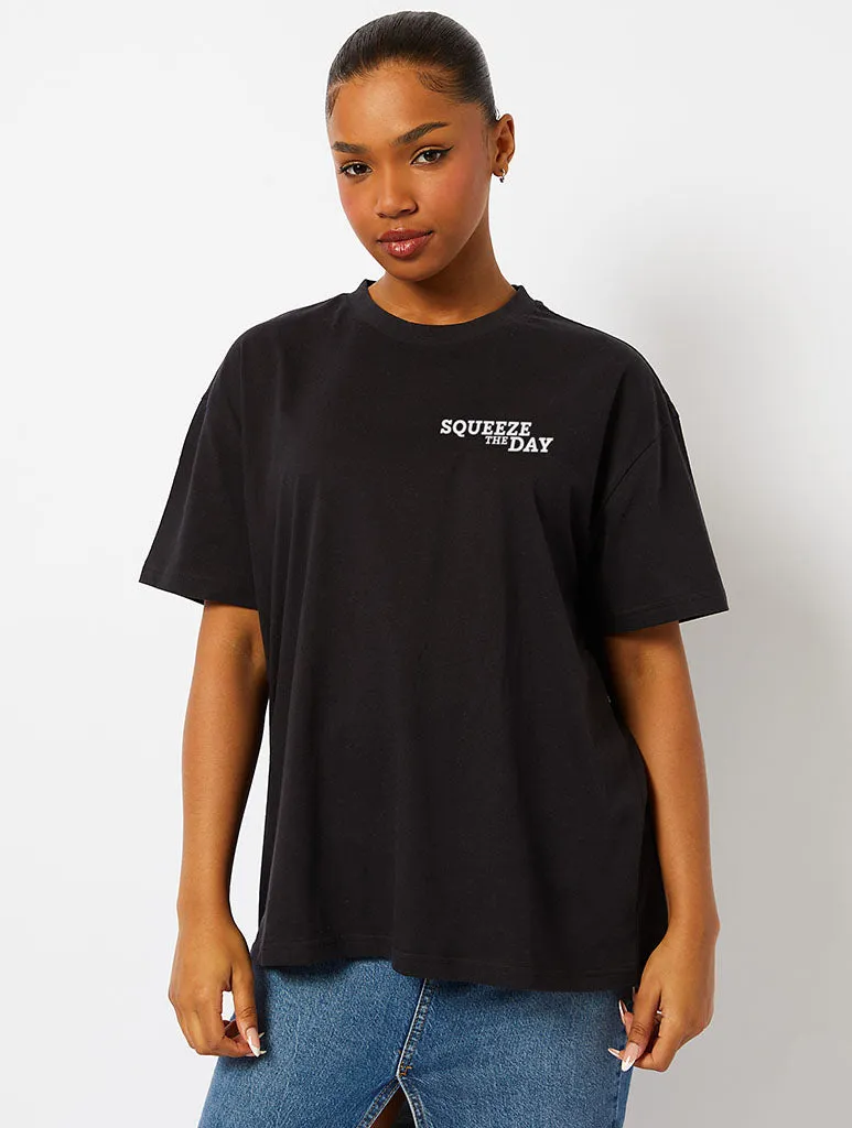 Peanuts x Skinnydip Snoopy Squeeze the Day T-Shirt in Black sold by Skinnydip London product image thumbnail 2