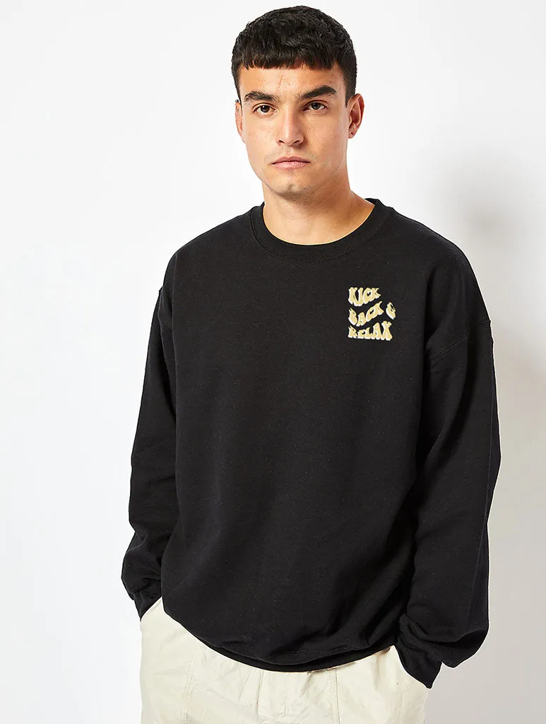 Peanuts x Skinnydip Snoopy Kick Back & Relax Sweatshirt in Black sold by Skinnydip London product image thumbnail 2