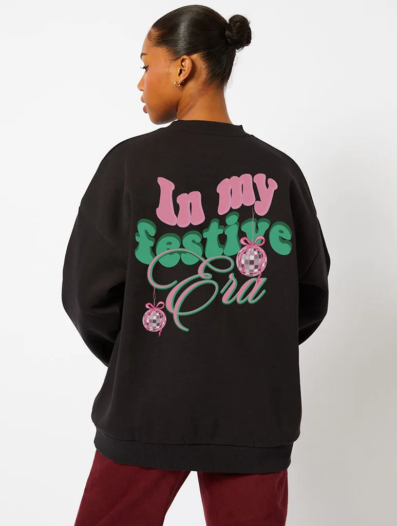 In My Festive Era Sweatshirt in Black sold by Skinnydip London