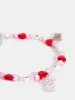 Disney Aristocats Heart Beaded Phone Strap sold by Skinnydip London