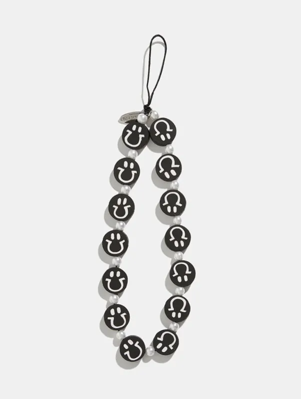 Black and White Smile Face Beaded Phone Strap sold by Skinnydip London