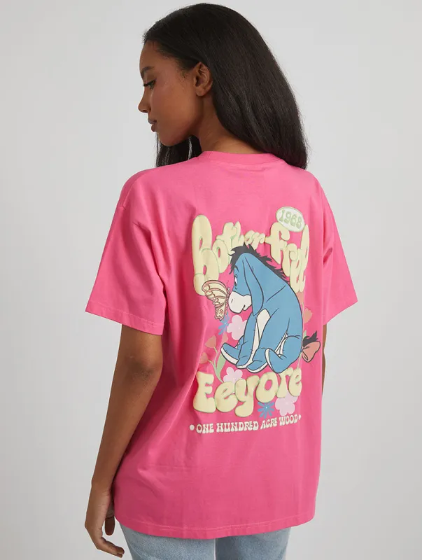 Disney Eeyore Bother Free T-Shirt in Pink sold by Skinnydip London