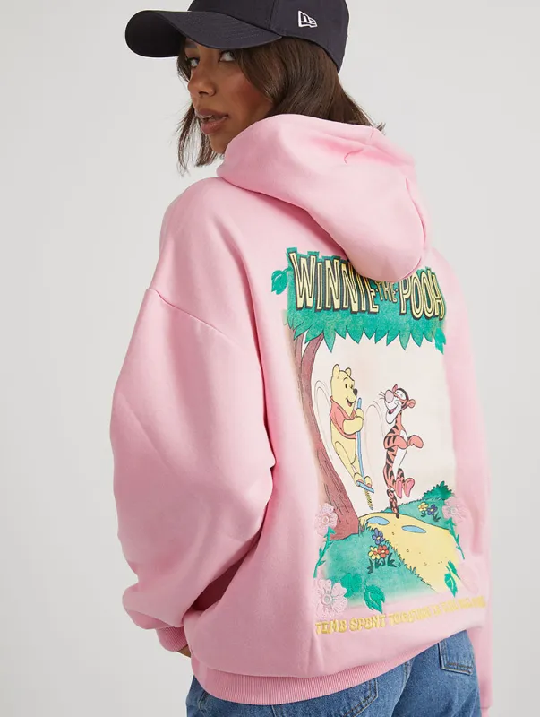 Disney Winnie The Pooh Time Well Spent Hoodie in Pink sold by Skinnydip London