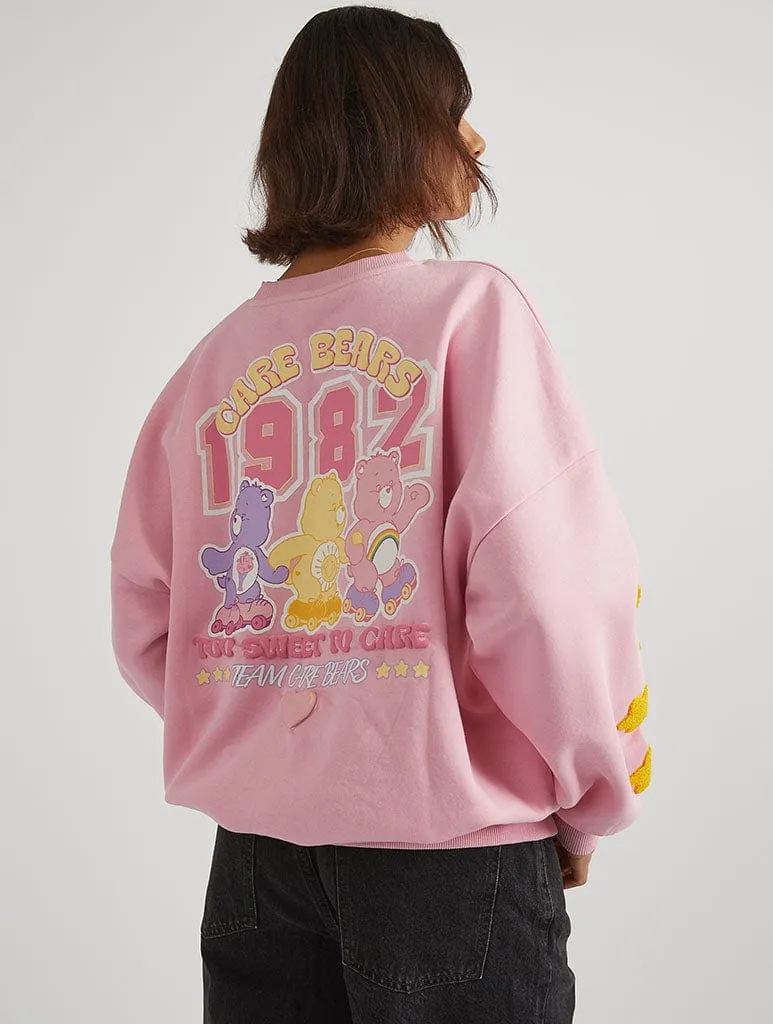 Care Bears x Skinnydip Too Sweet To Care Sweatshirt in Pink sold by Skinnydip London