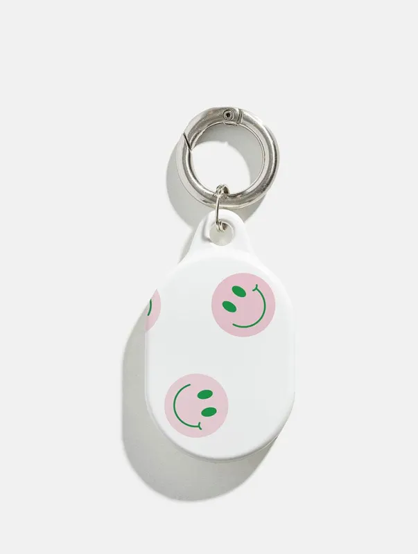 Pink and Green Smiley AirTag Case in Gloss sold by Skinnydip London
