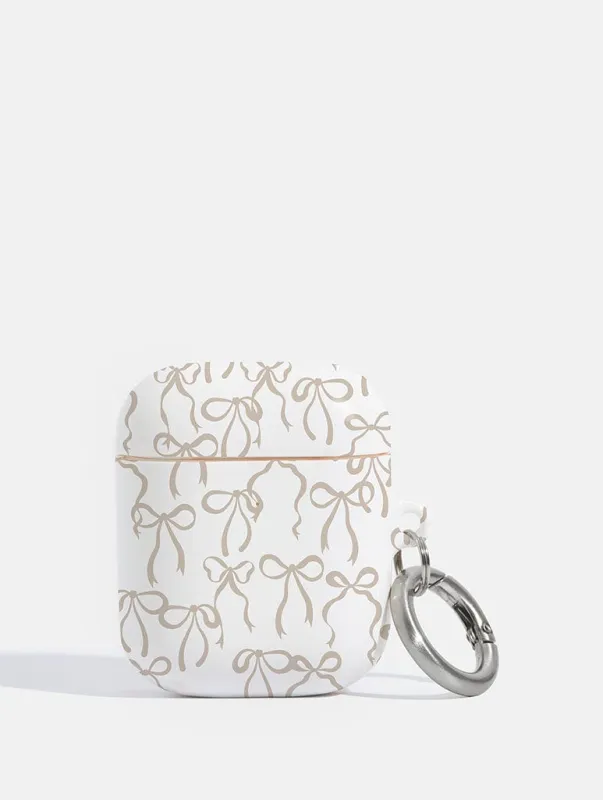 Neutral Bows AirPods Case sold by Skinnydip London