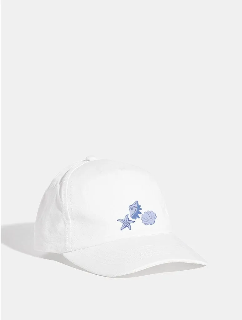 Sea Shells Cap in White sold by Skinnydip London