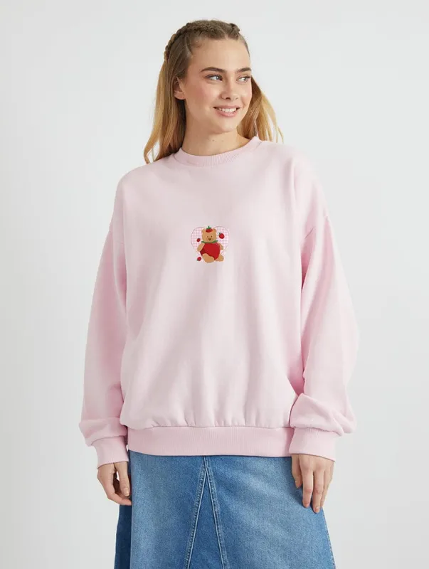 Strawberry Bear Sweatshirt In Pink sold by Skinnydip London