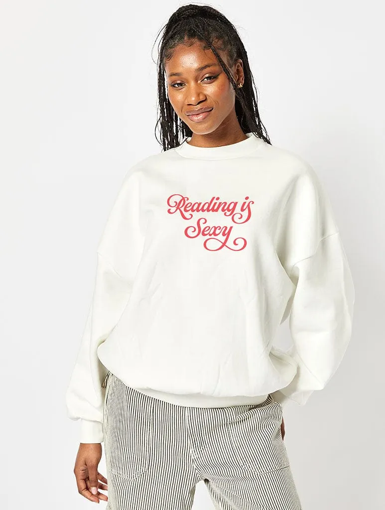Reading Is Sexy Sweatshirt In White sold by Skinnydip London
