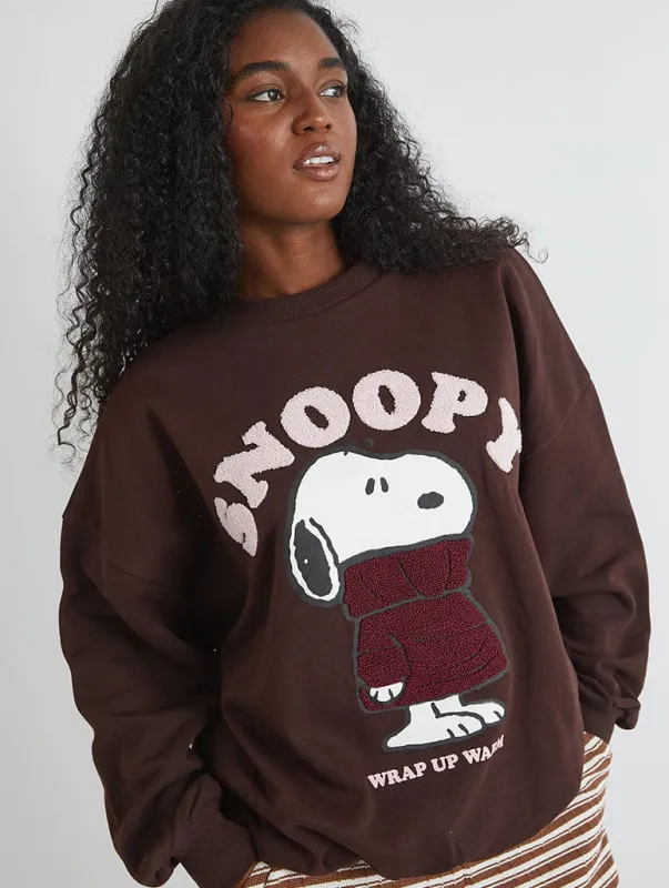 Peanuts x Skinnydip Snoopy Wrap Up Warm Sweatshirt sold by Skinnydip London