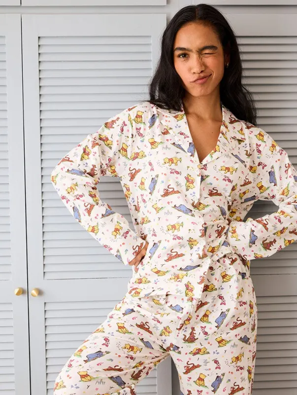 Disney Winnie The Pooh Pyjama Set in Ecru sold by Skinnydip London